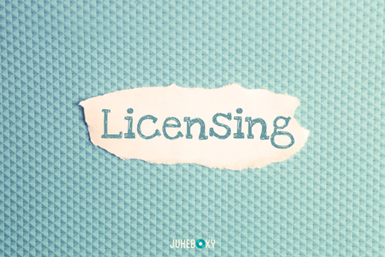 A piece of torn paper with the word "LicenSing" written on it, set against a textured blue background with the Jukeboxy logo at the bottom.
