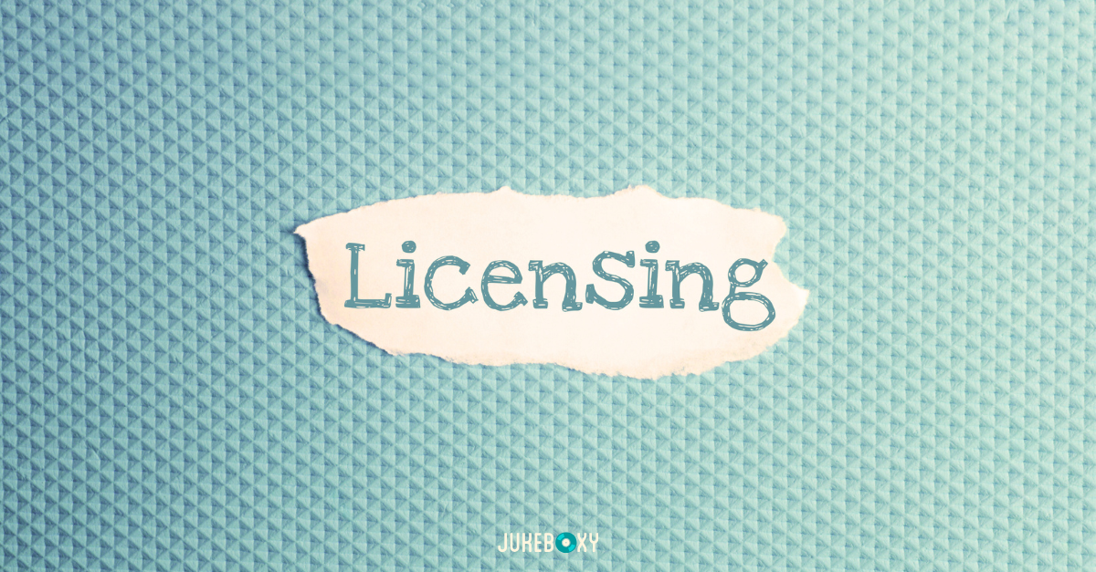 A piece of torn paper with the word "LicenSing" written on it, set against a textured blue background with the Jukeboxy logo at the bottom.